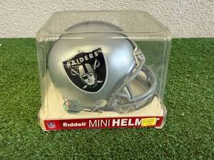 lot 83 image: Oakland Raiders Riddell Mini Helmet