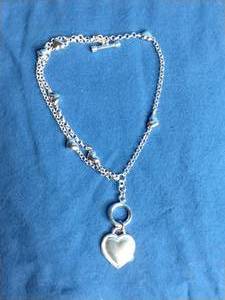 lot 12 image: Silvertone Heart Charm Bracelet