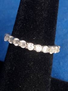 lot 33 image: Sterling Silver CZ Anniversary Ring Size 6