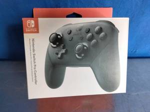 lot 106 image: Nintendo Switch Pro Controller.
