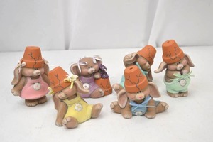 lot 12 image: Set of 6 Ceramic Bunny Figurines in Pastel Outfits with Flower Pot Hats