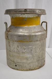 lot 99 image: Mid-Century Twin City Embossed Vintage Milk Can
