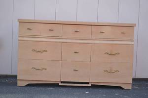 lot 216 image: Light Wood 9-Drawer Dresser with Brass Handles