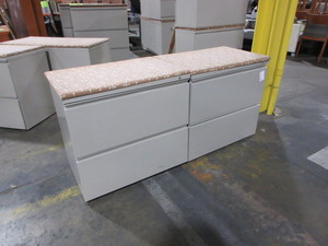 lot 228 image: HERMAN MILLER TWO DRAWER LATERAL FILES WITH CUSHION TOPS