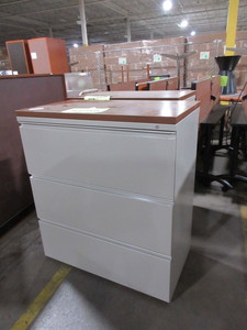 lot 229 image: HERMAN MILLER THREE DRAWER LATERAL FILES WITH WOOD TOPS