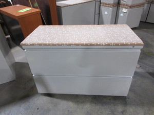 lot 222 image: HERMAN MILLER TWO DRAWER LATERAL FILES WITH CUSHION TOPS