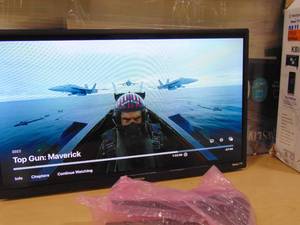 lot 32 image: 24 Inch Westinghouse 720p LED Roku Smart TV WR24HT2212