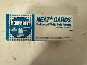 lot 26 image: JJ. 100ct Medium Duty White Poly Aprons