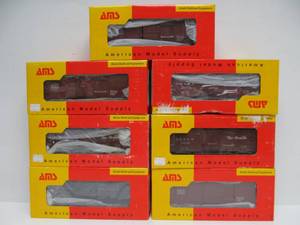 lot 107 image: Lot of 7 Mint in Box AMS Train Cars - On3 Scale