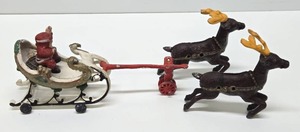 lot 332 image: Cast Iron Santas Sleigh wReindeer 