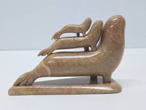 lot 324 image: Carved Stone Family of Seals Sculptures