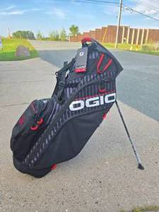 lot 304 image: Excellent Quality Brand New in Box OGIO Golf Bag #2 - Stoli Vodka