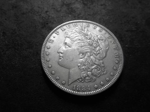 lot 8 image: 1884 Morgan Silver Dollar