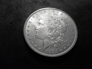 lot 9 image: 1884 O Morgan Silver Dollar