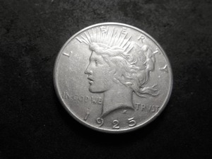 lot 24 image: 1925 Peace Silver Dollar