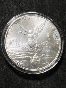 lot 07 image: 2009 MEXICAN PLATA PURA 1 TROY OZ .999 FINE SILVER IN AIRTITE
