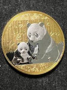 lot 16 image: 2012 CHINESE PANDA 1 TROY OZ .999 FINE SILVER GOLD PLATED