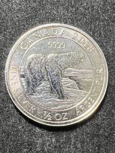 lot 25 image: 2018 CANADIAN POLAR BEAR HALF TROY OZ .9999 FINE SILVER