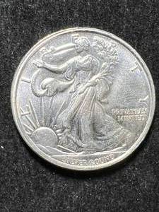 lot 38 image: HALF TROY OZ .999 FINE SILVER WALKING LIBERTY ROUND