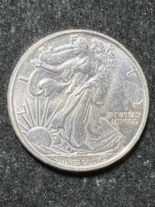 lot 62 image: HALF TROY OZ .999 FINE SILVER WALKING LIBERTY ROUND