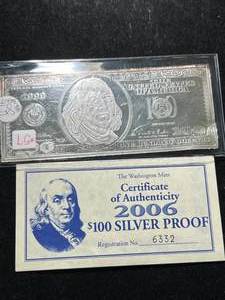 lot 73 image: 4 TROY OZ .999 FINE SILVER $100 BILL DESIGNED BAR