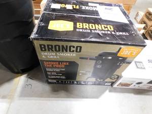 lot 185 image: OKLAHOMA JOES Bronco Charcoal Drum Smoker and Grill in Black with 284 sq. in. of Cooking Space
