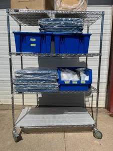 lot 7 image: MSRP $800 High Quality&nbspQuantum Storage Systems Heavy Duty Shelving System 4 Tier Stainless Steel Chrome Finish Wire Storage Cart Truck WLocking Wheels - Great Condition (Contents Not Included)