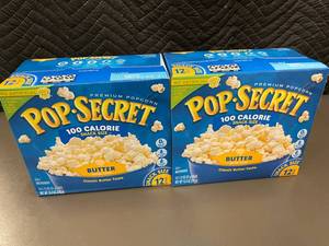 lot 118 image: Trol - 2 Boxes Pop Secret 100 Calorie Butter Snack Size Popcorn, 12 Bags per Box