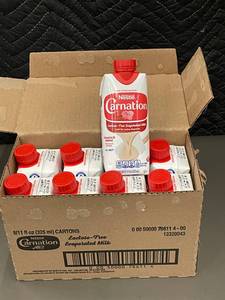 lot 446 image: SC 3 - 8-Pack Nestle Carnation Lactose-Free Evaporated Milk 11oz Cartons (102024)
