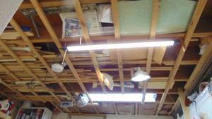 lot 14 image: Contents of Ceiling, 2 Corners, Under Workbench and Lights in the Ceiling that Plug In