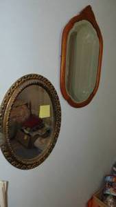 lot 74 image: 2-Vintage Mirrors, 1 plastic and 1 wood with Bevel Edge