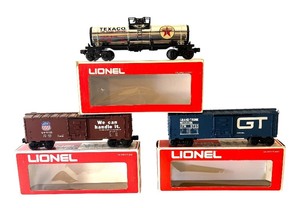 lot 36 image: Lionel Grand Trunk and Union Pacific Box Cars with Texaco Tank Car