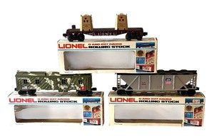lot 87 image: Lionel O and O27 Gauge Train Car Set with Boxes - Marines Bunk Car, Radioactive Waste Car and Union Pacific Hopper