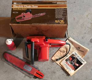 lot 136 image: Sears Craftsman Electric Chainsaw