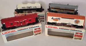 lot 169 image: Four Lionel 0 & 027 Gauge Tank Cars