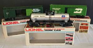 lot 177 image: Trio of Lionel 0 & 027 Gauge Freight Carriers