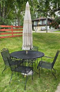 lot 216 image: Black Metal Patio Table Set with Sun Umbrella
