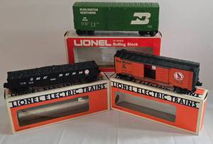 lot 248 image: Three Electric Lionel Train Cars including Lionel Model 6-19401 Great Northern Gondola with Coal and More