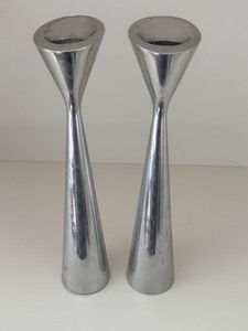 lot 24 image: Pair of Nambe Studio 8 Inch Aluminum Candle Holders