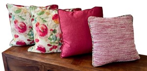 lot 31 image: Set of 4 Decorative Throw Pillows in Luxurious Fabrics