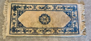 lot 42 image: Oriental Style Area Rug with Blue Floral Pattern 56 x 27 Inches