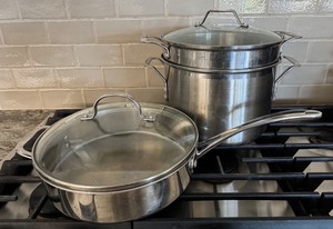 lot 58 image: Calphalon Stainless Steel Cookware Set 3 Qt Saute Pan and 8 Qt Sauce Pot with Lids