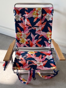 lot 65 image: Tommy Bahama Beach Chair with Floral Pattern and Backpack Straps
