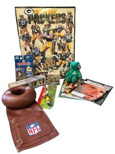 lot 27 image: Green Bay Packers Collectibles Lot with Posters, Magazines, Figures and Plush