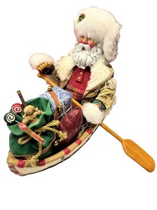 lot 80 image: Possible Dreams Clothtique Santa in Rowboat Holiday Figurine