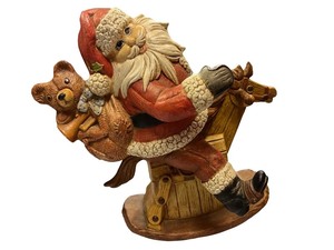 lot 83 image: Santa Claus Figurine on Rocking Horse with Toys
