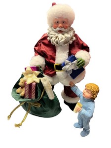 lot 86 image: Possible Dreams Clothtique Santa with Gift Bag and Child Figure