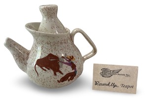 lot 37 image: Red Wing Pottery Round Up Teapot with Cowboy and Bull Motif