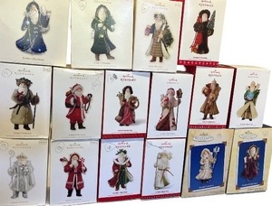 lot 93 image: Collection of 17 Hallmark Keepsake Father Christmas Ornaments with Boxes
