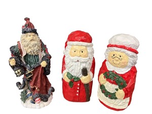lot 138 image: Set of 3 Holiday Santa and Mrs. Claus Figurines